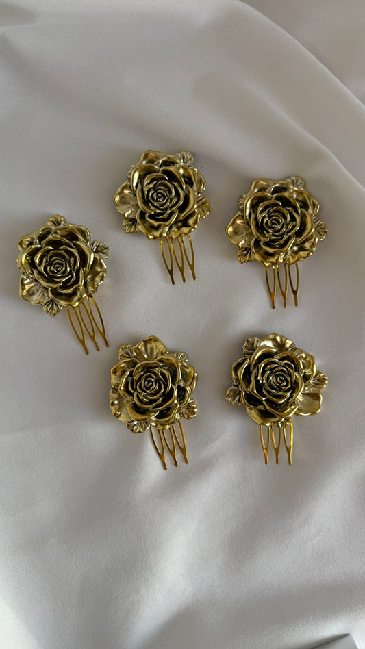 Peinecillos rosas doradas